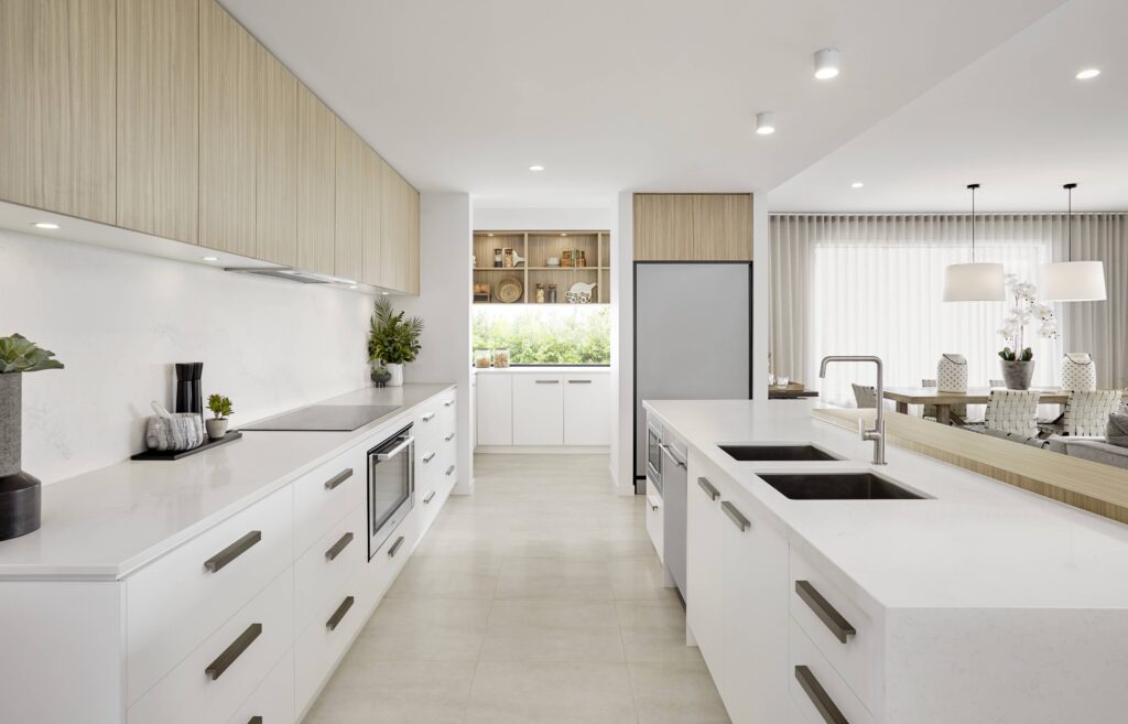 Cucina moderna bianca in primo piano il rubinetto Clik soda